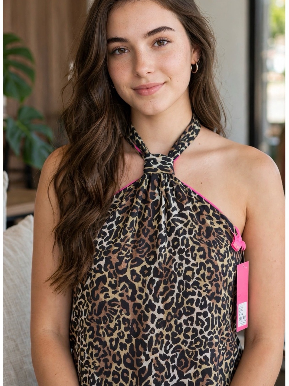 Lilly Pulitzer Caden Top featuring a classic leopard print & Pink Lining. Size M